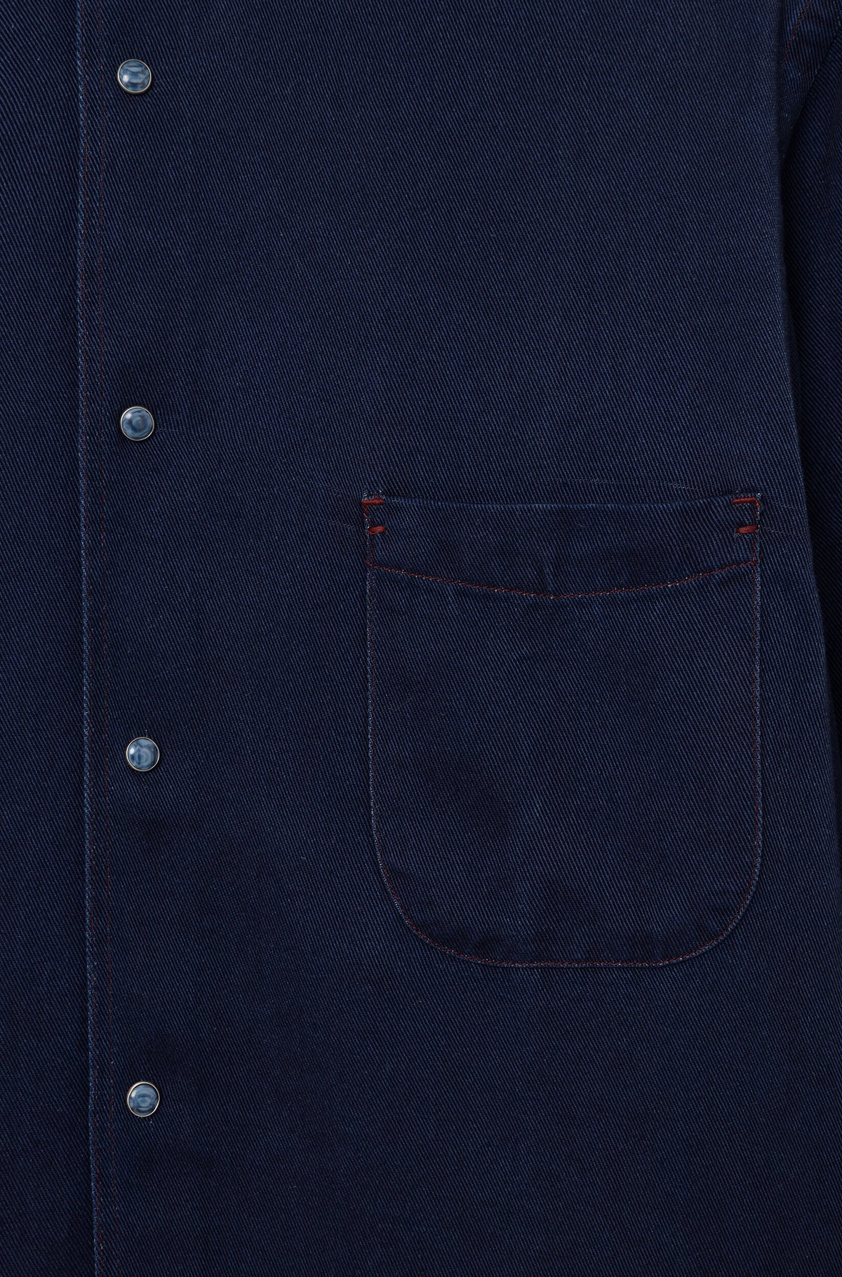 Detail of the chest patch pocket and snap buttons of the AD 73 lyocell shirt in indigo — Ace Denim Paris