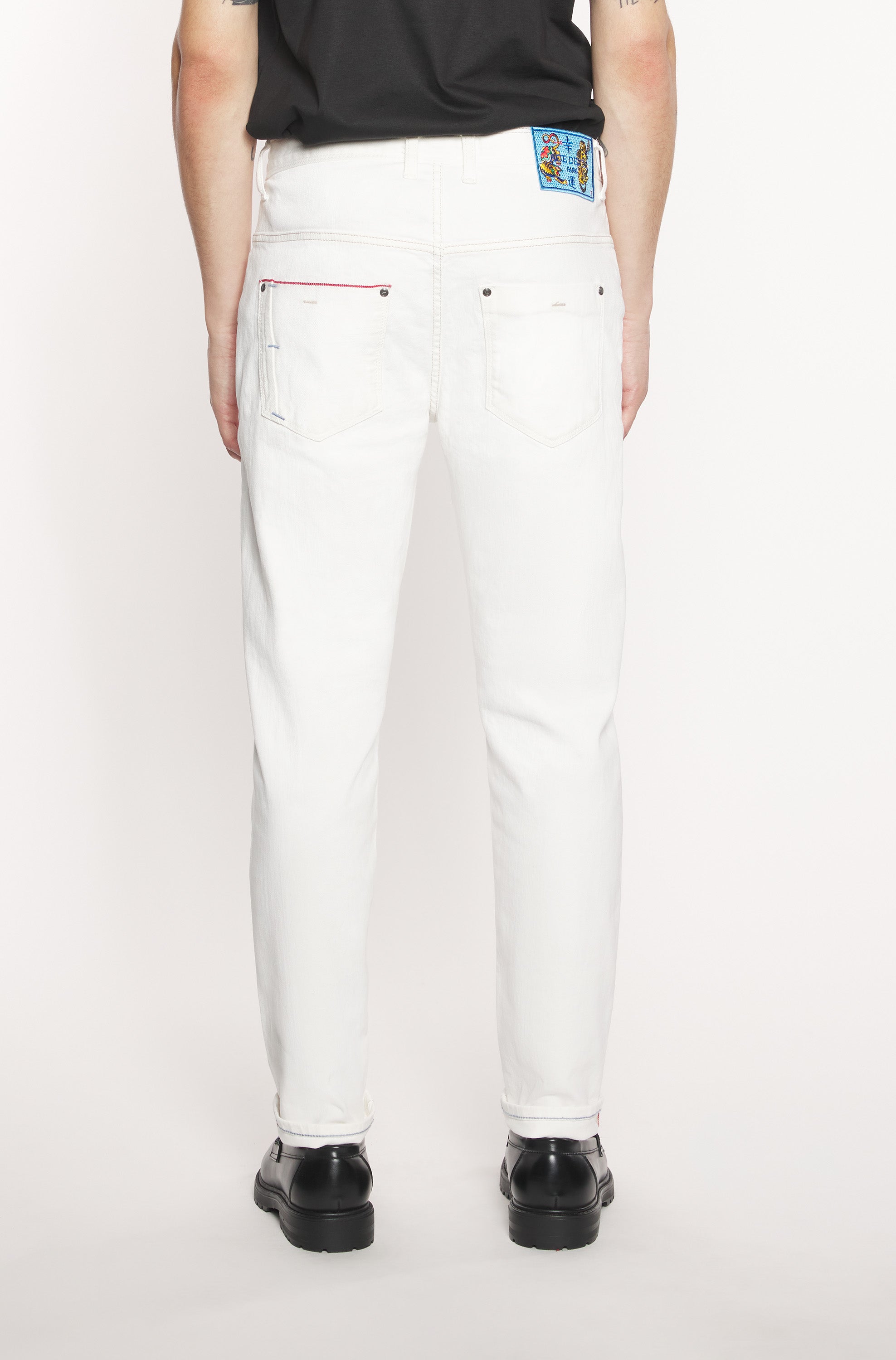 Back of the model wearing the white jeans in Japanese selvedge