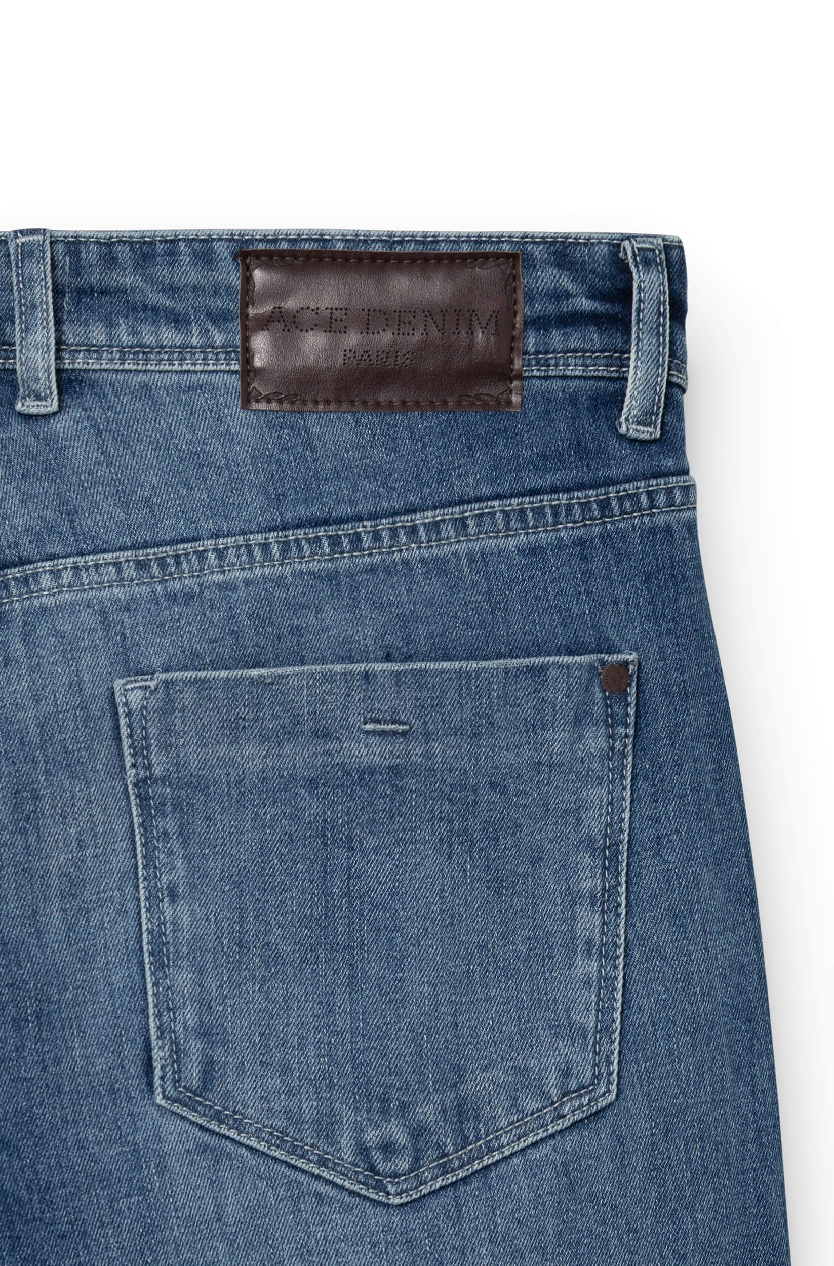 Detail of the back of the blue jeans AD03 with a brown leather patch engraved Ace Denim Paris