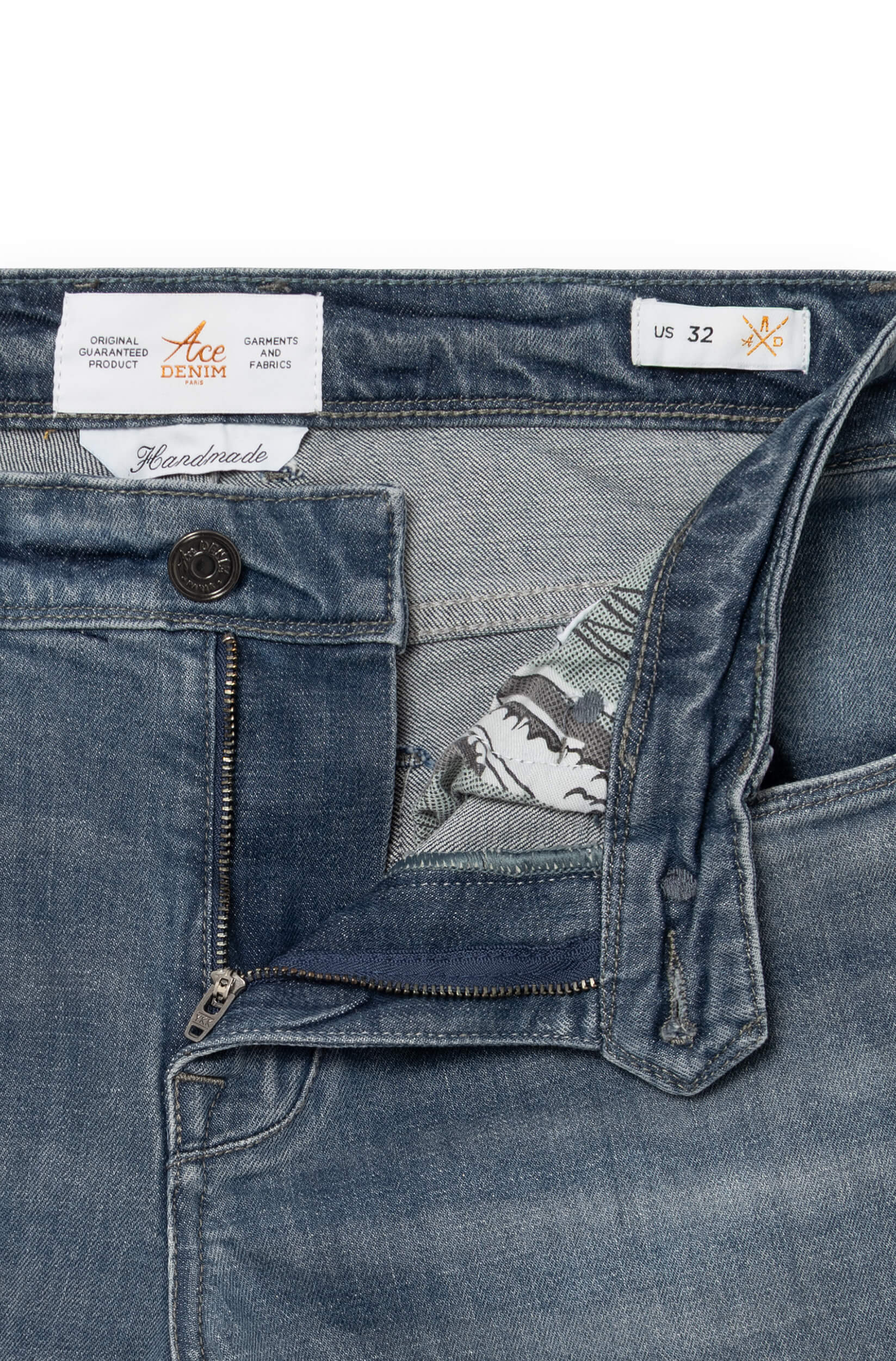 Detail of the fly and the metal button