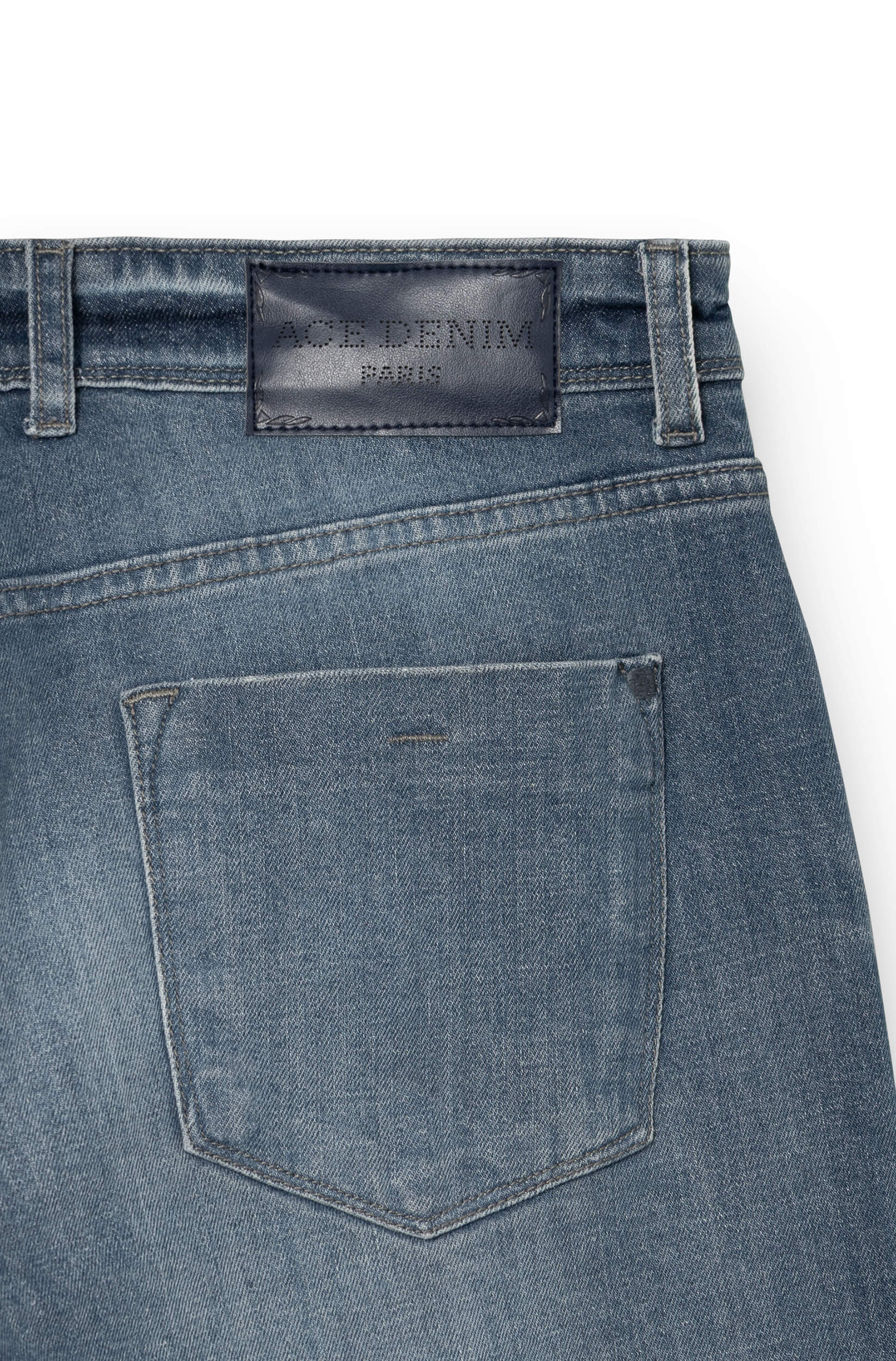 Detail of the navy leather patch engraved Ace Denim Paris