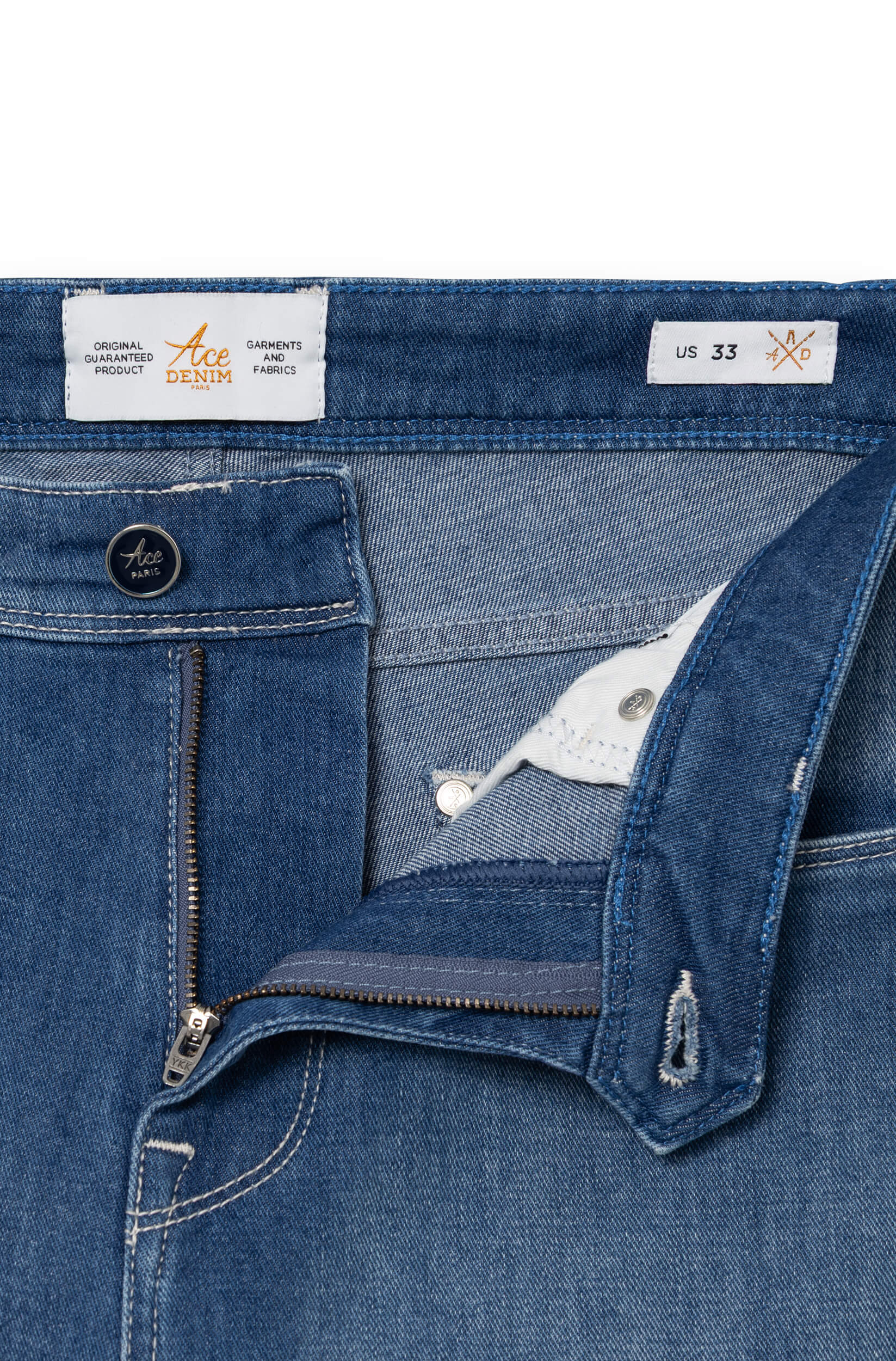 Detail of zip fly and engraved Ace Paris lacquered button — AD 33 Ace Denim Paris
