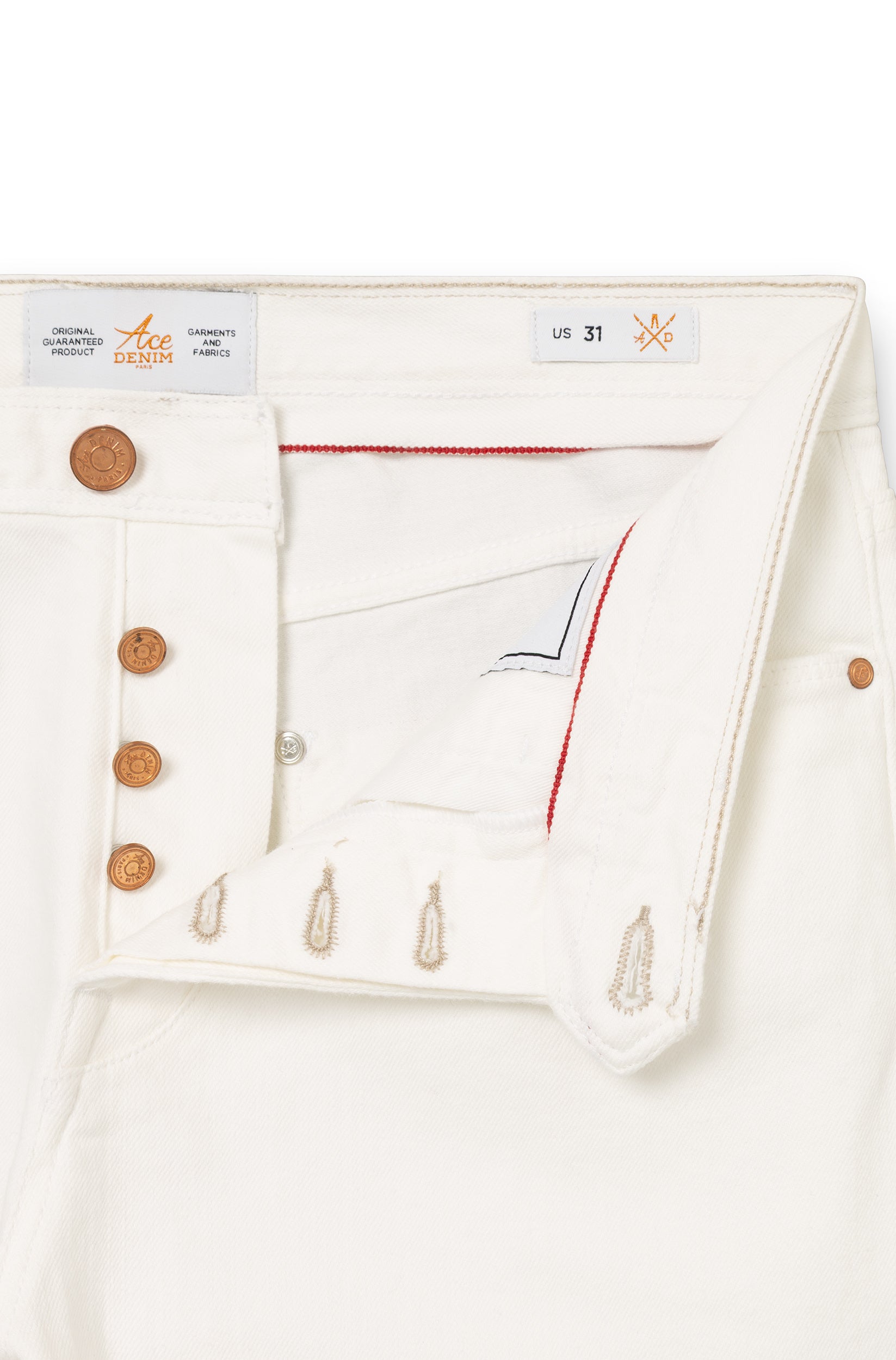 Détail de la braguette boutons cuivrés gravés et liseré selvedge blanc — AD 53 Selvedge Ace Denim Paris