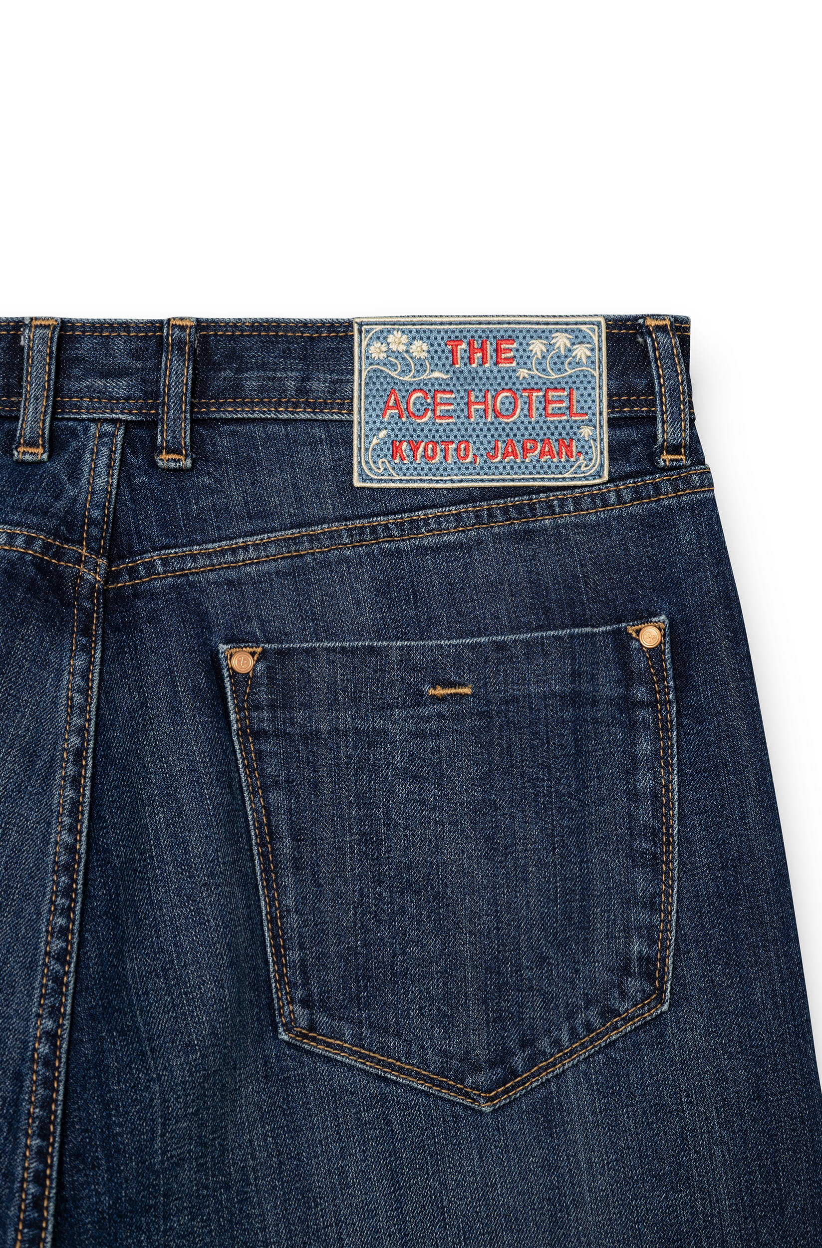 Detail of embroidered signature patch on back waistband of AD 53 Selvedge — Ace Denim Paris