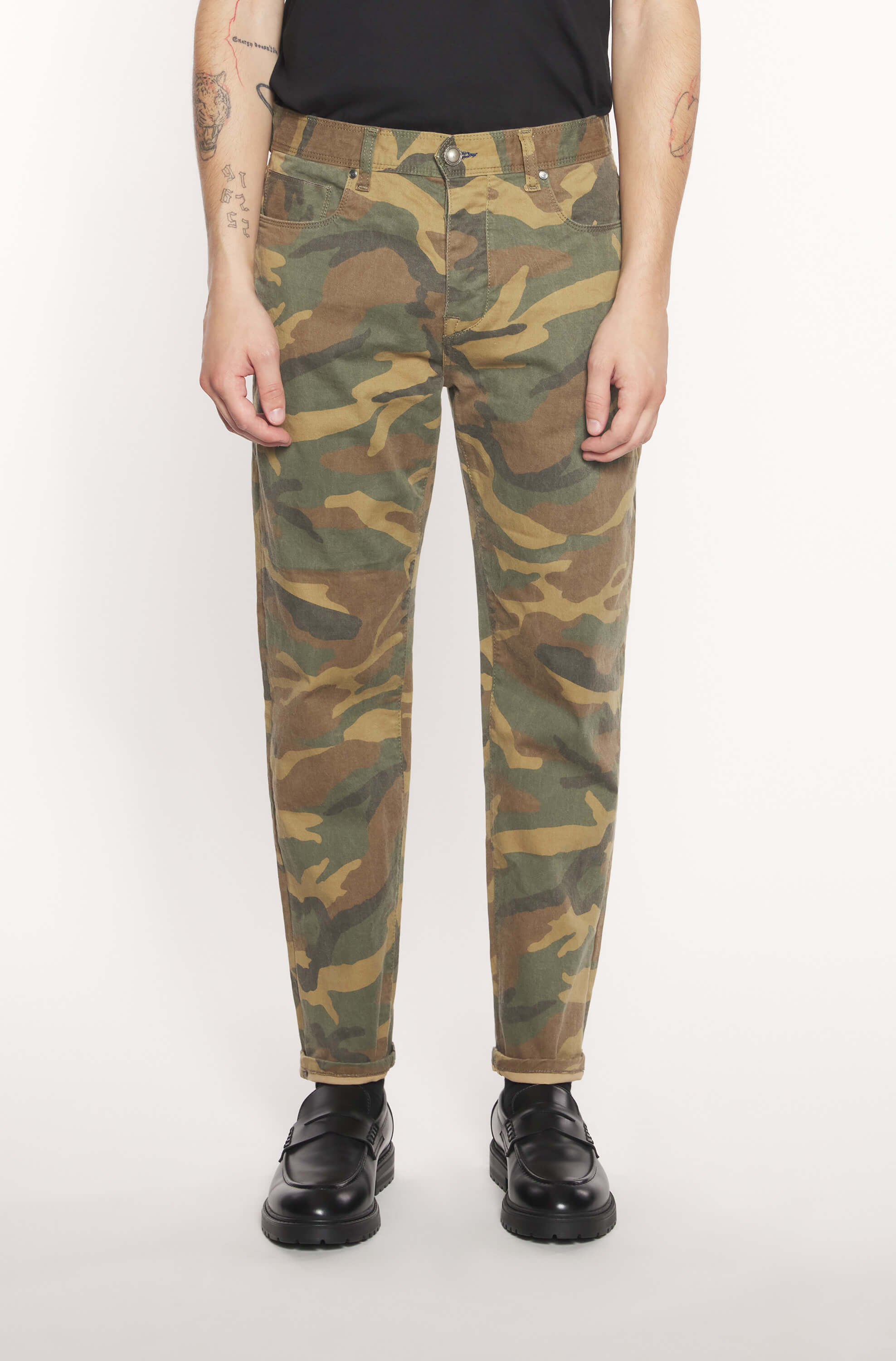Mannequin wearing selvedge jeans with camouflage pattern