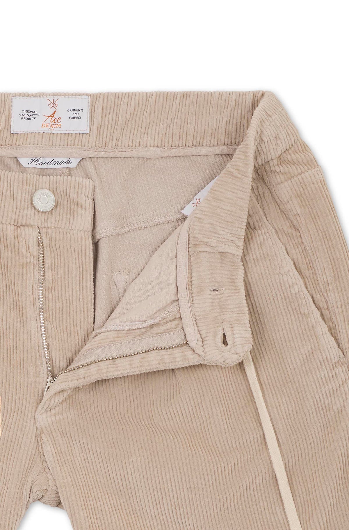 Detail waistband and fly, beige corduroy trousers, Handmade label, button and zip — Ace Denim Paris