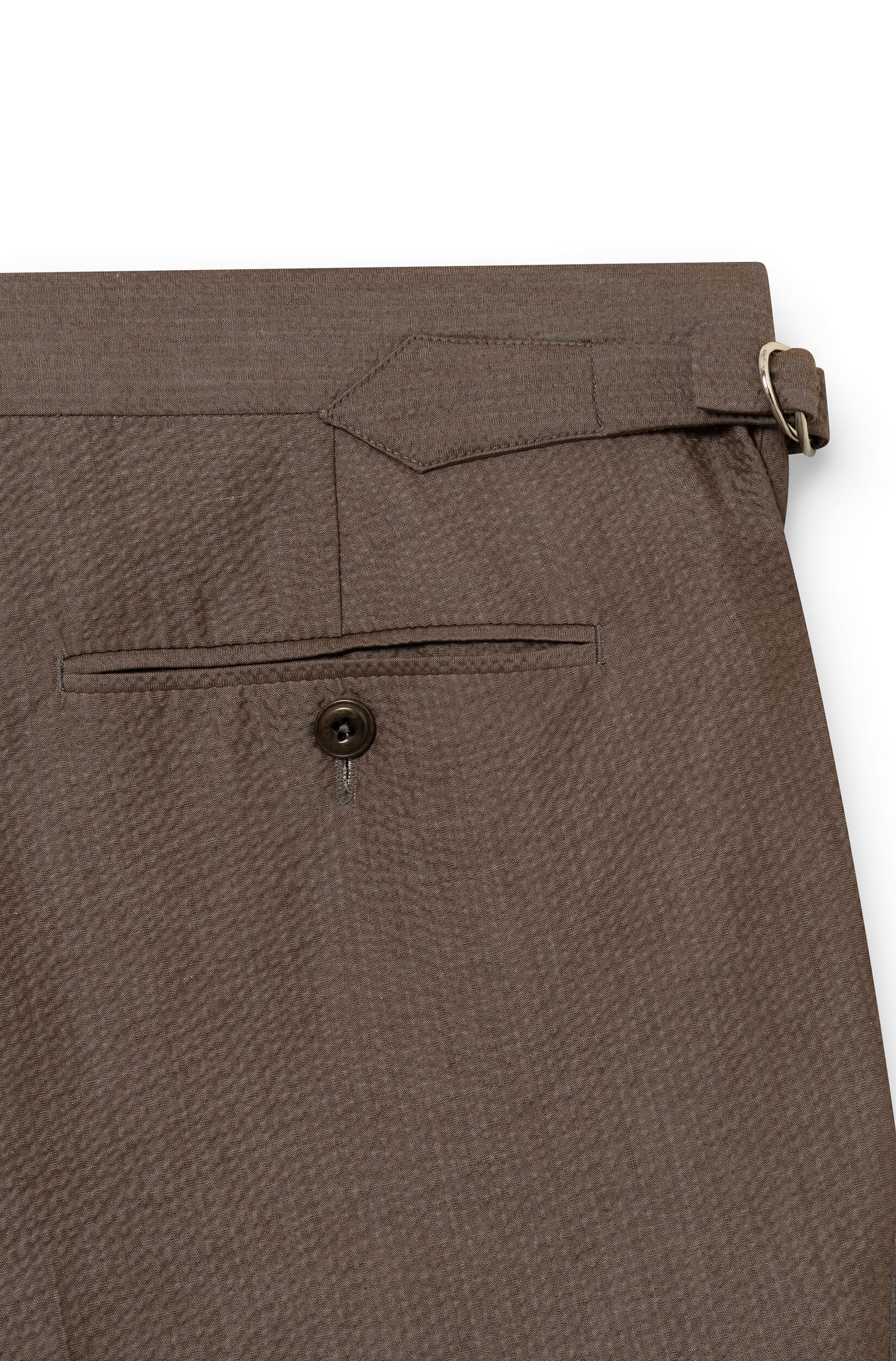 Detail of the waist adjuster with metal buckle and welt pocket — AD 52 Ace Denim Paris