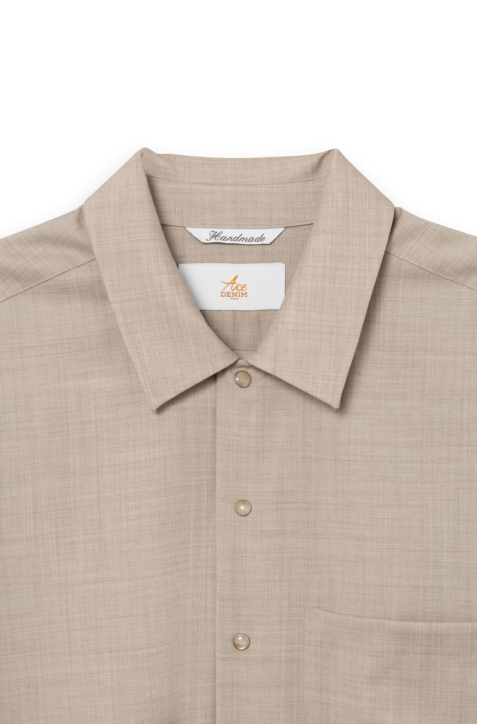 Detail of the classic shirt collar and signature snap buttons — AD 82 Ace Denim Paris