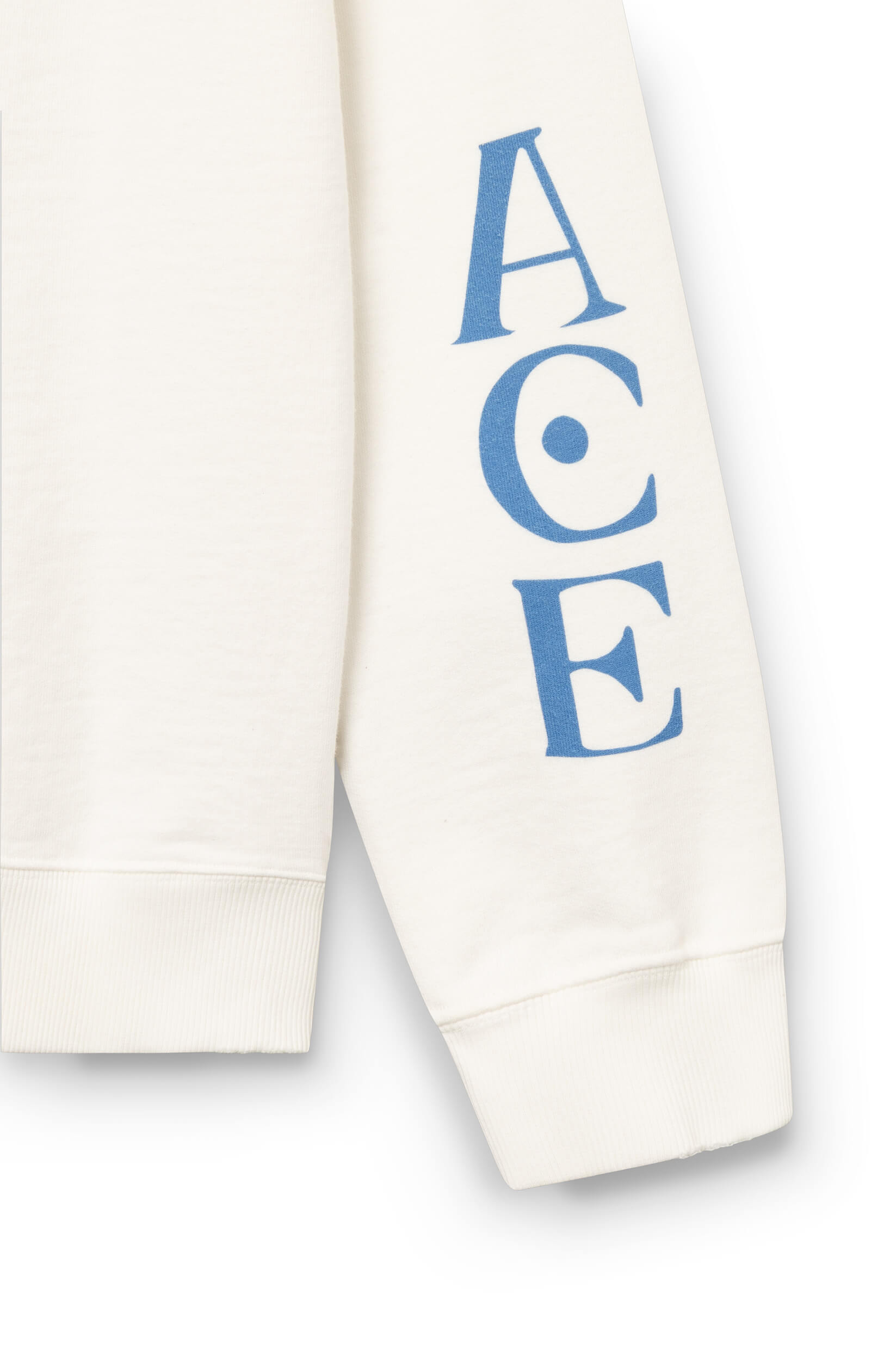 Close-up of the sleeve of the off-white cotton sweatshirt, hand-dyed and printed with a tiger by ace Paris