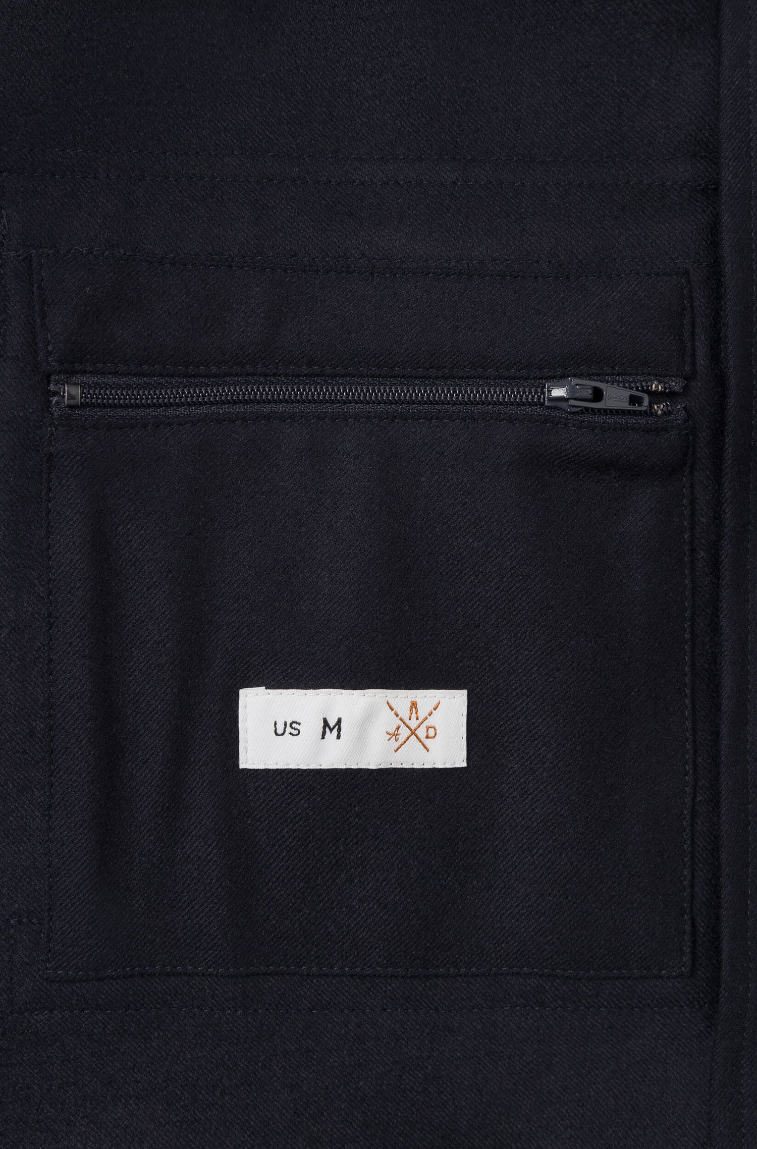 Inner pocket of the navy jacket
