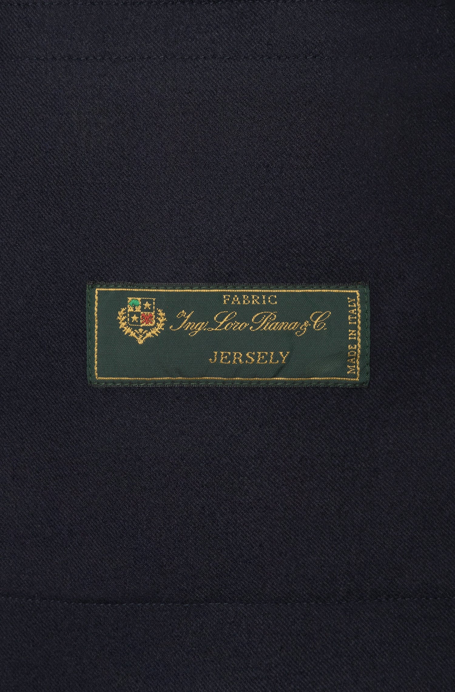 Loro Piana label of the navy merino wool jacket