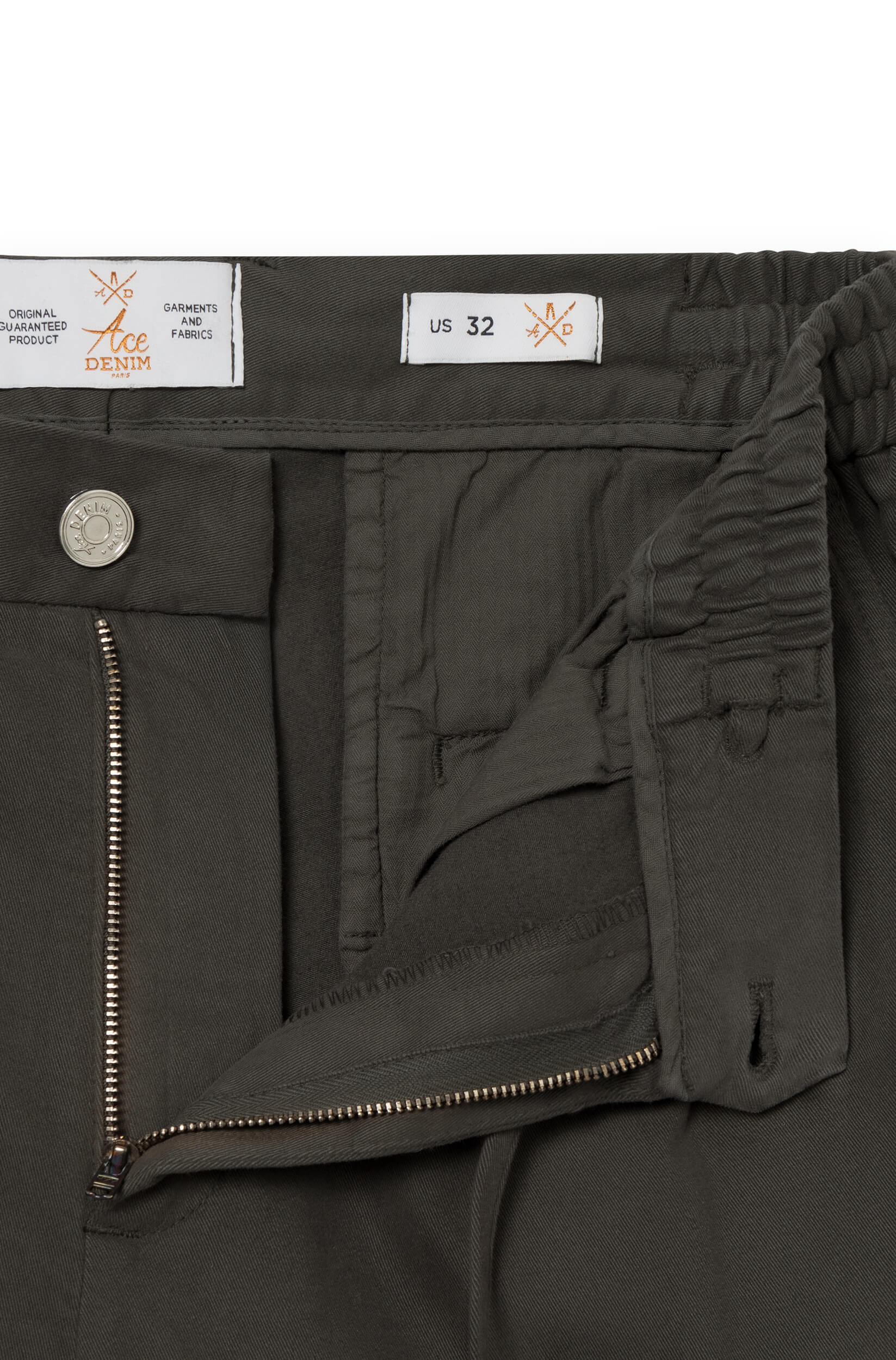 Close-up of the zipped fly of the khaki cashmere trousers