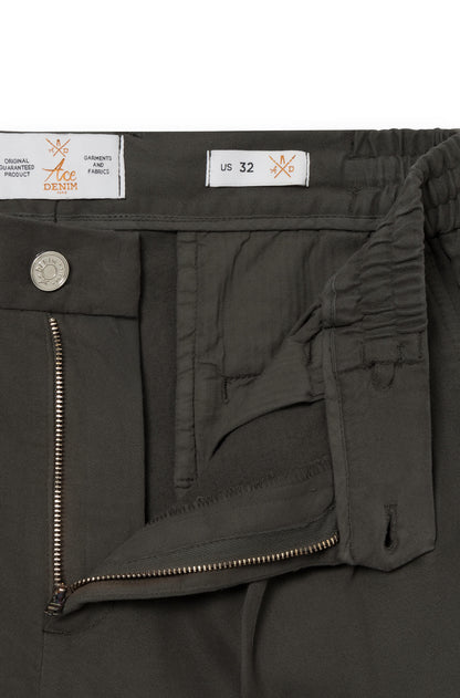 Close-up of the zipped fly of the khaki cashmere trousers
