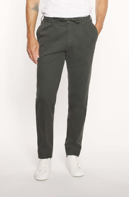 Mannequin wearing slim khaki cashmere chinos for men