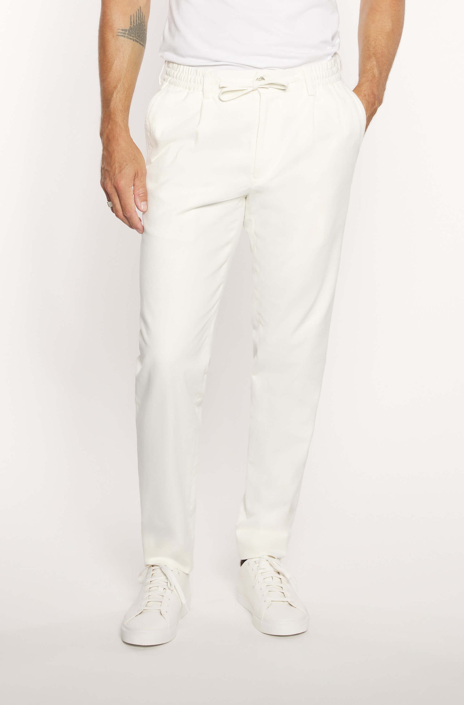 Mannequin wearing slim khaki cashmere chinos for men