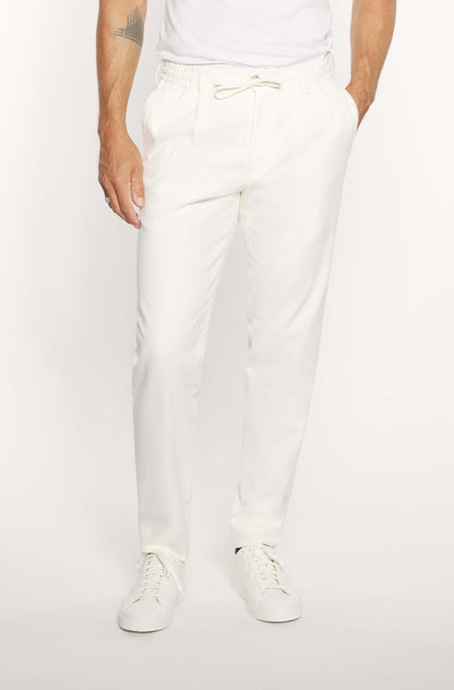 Mannequin wearing slim khaki cashmere chinos for men