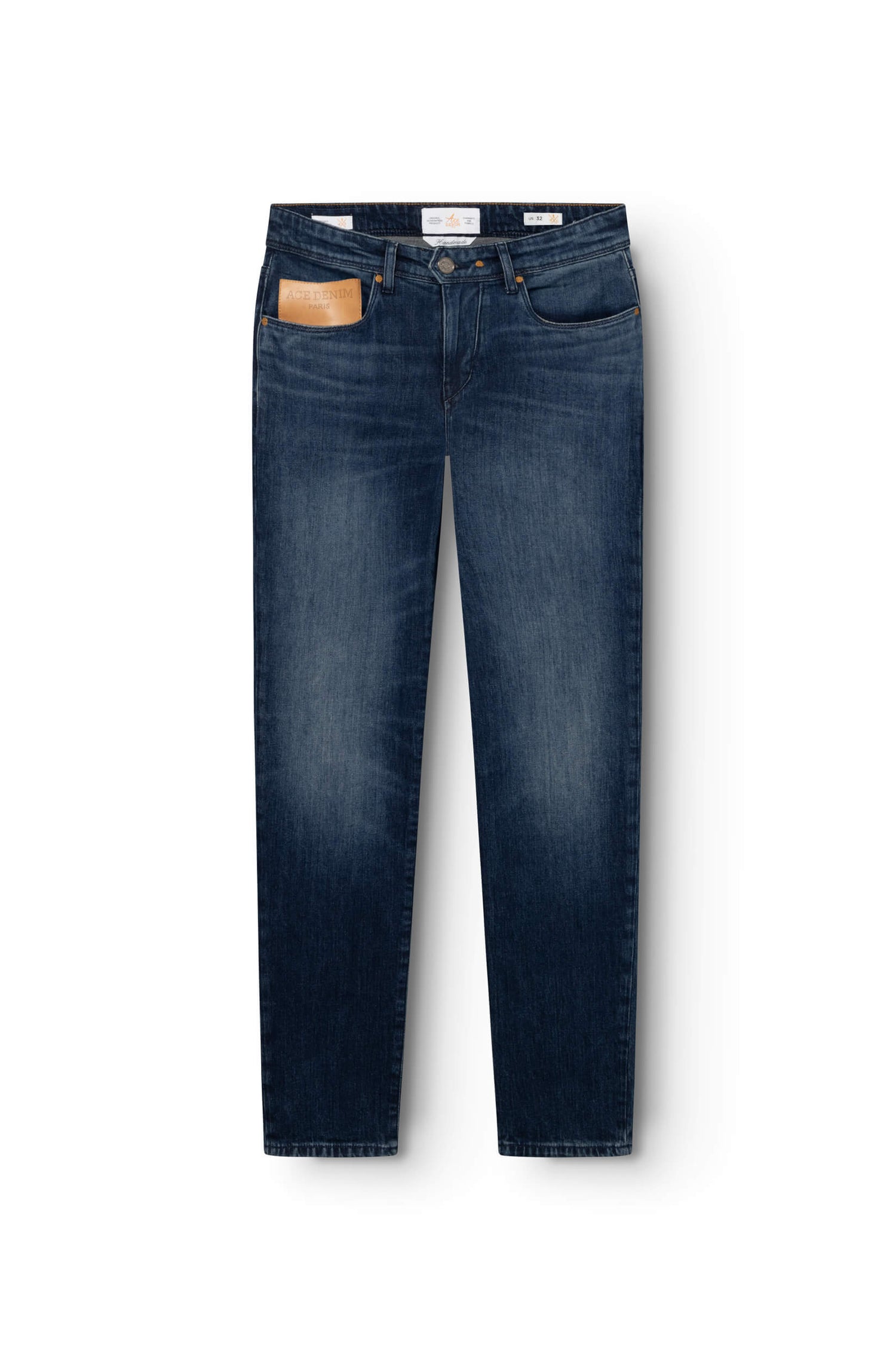 Jeans bleu foncé en coton avec patch en cuir beige