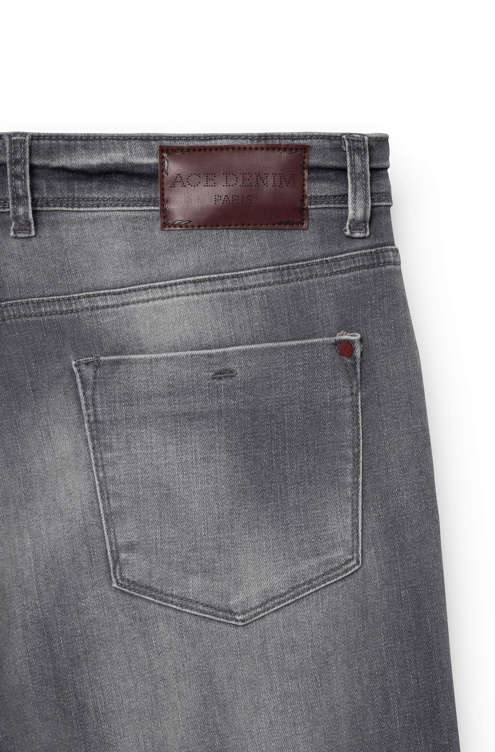 Detail of the back of the grey jeans AD03 with a burgundy leather patch engraved Ace Denim Paris