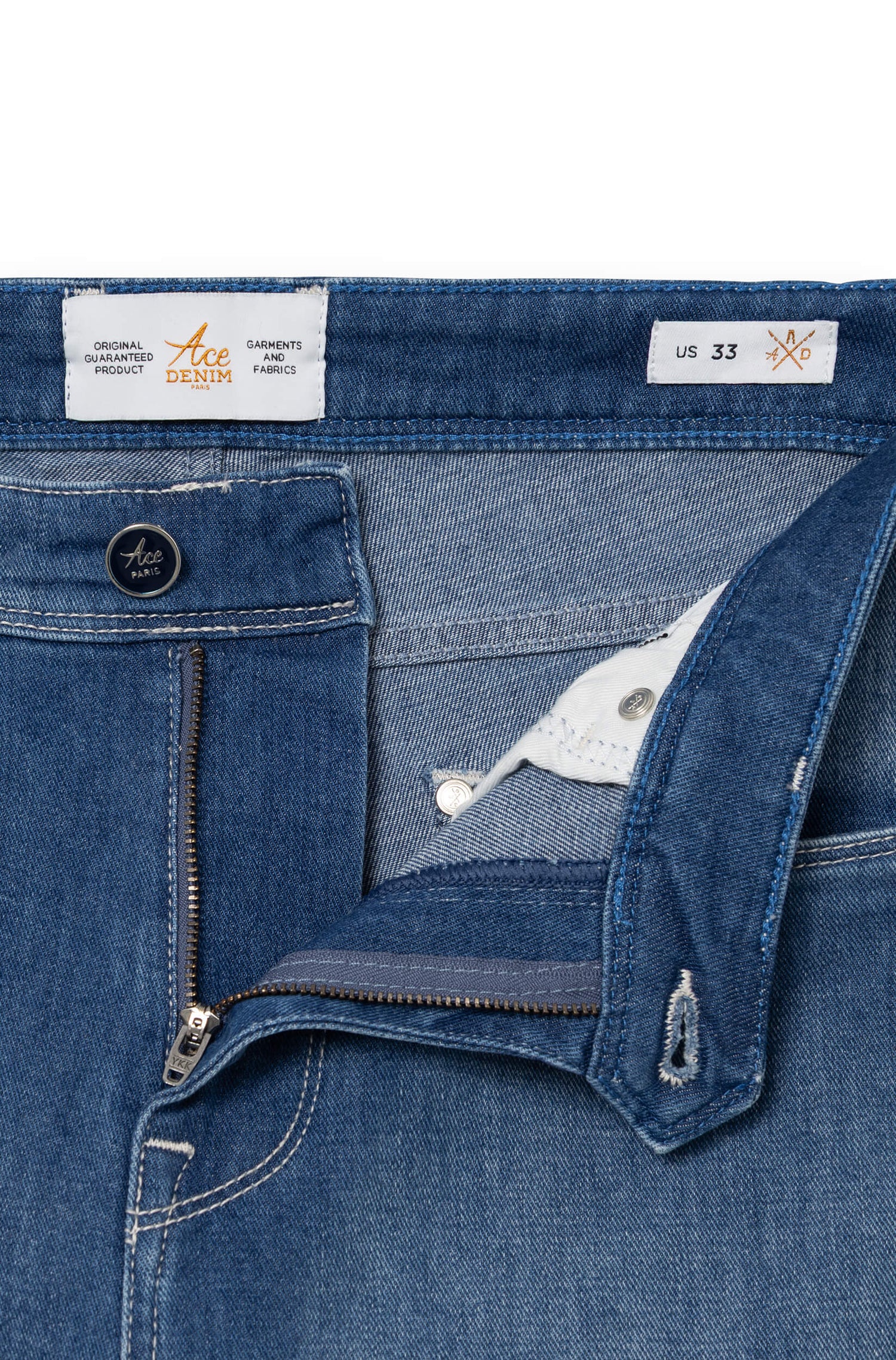 Detail of zip fly and engraved Ace Paris lacquered button — AD 33 Ace Denim Paris