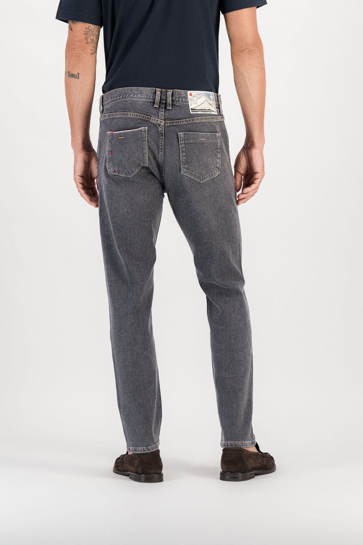 Back view Kurabo grey carrot fit jeans worn, back pockets and Mont Fuji patch — AD 56 Ace Denim Paris