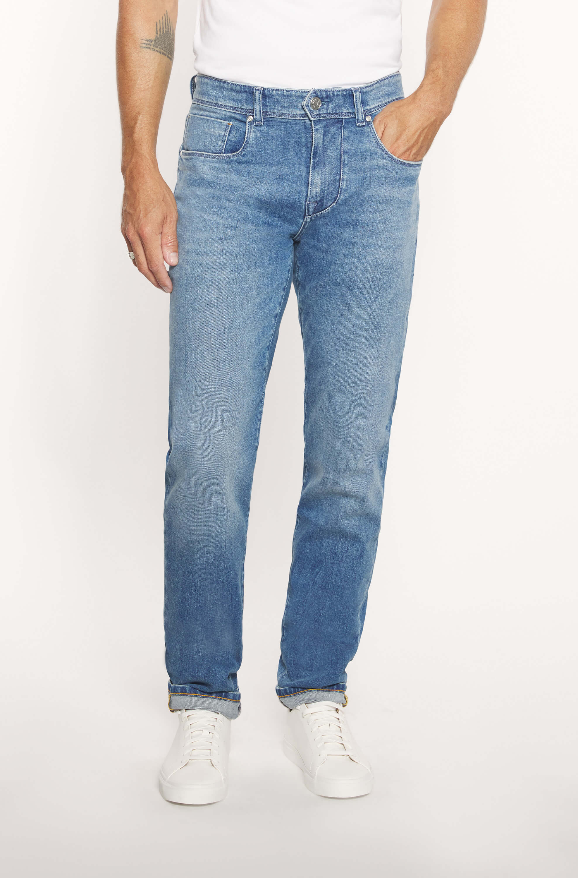 Mannequin wearing light blue cashmere jeans