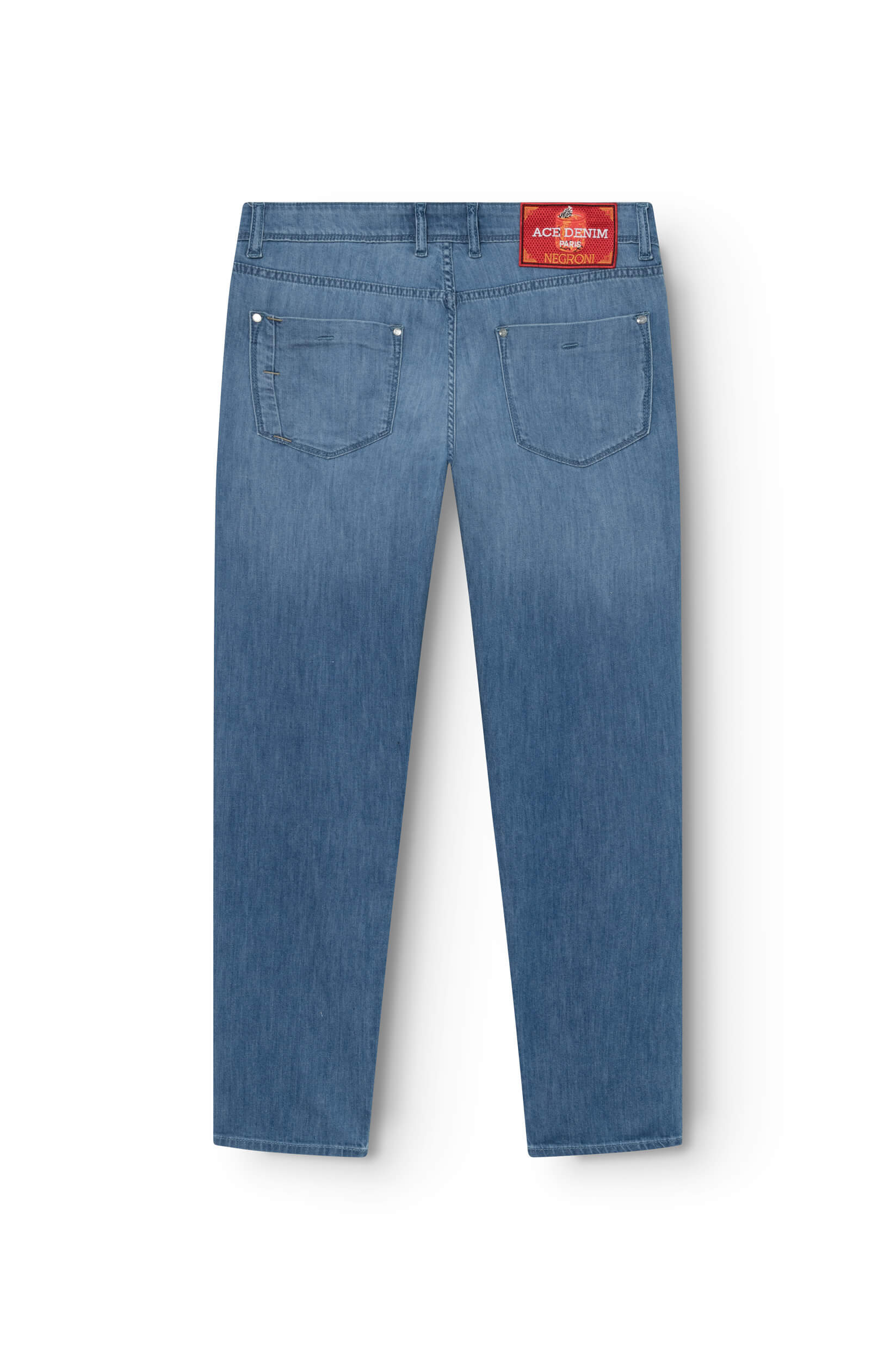 back of the slim jeans in blue cotton and flax for men with a patch featuring a Negroni cocktail pattern