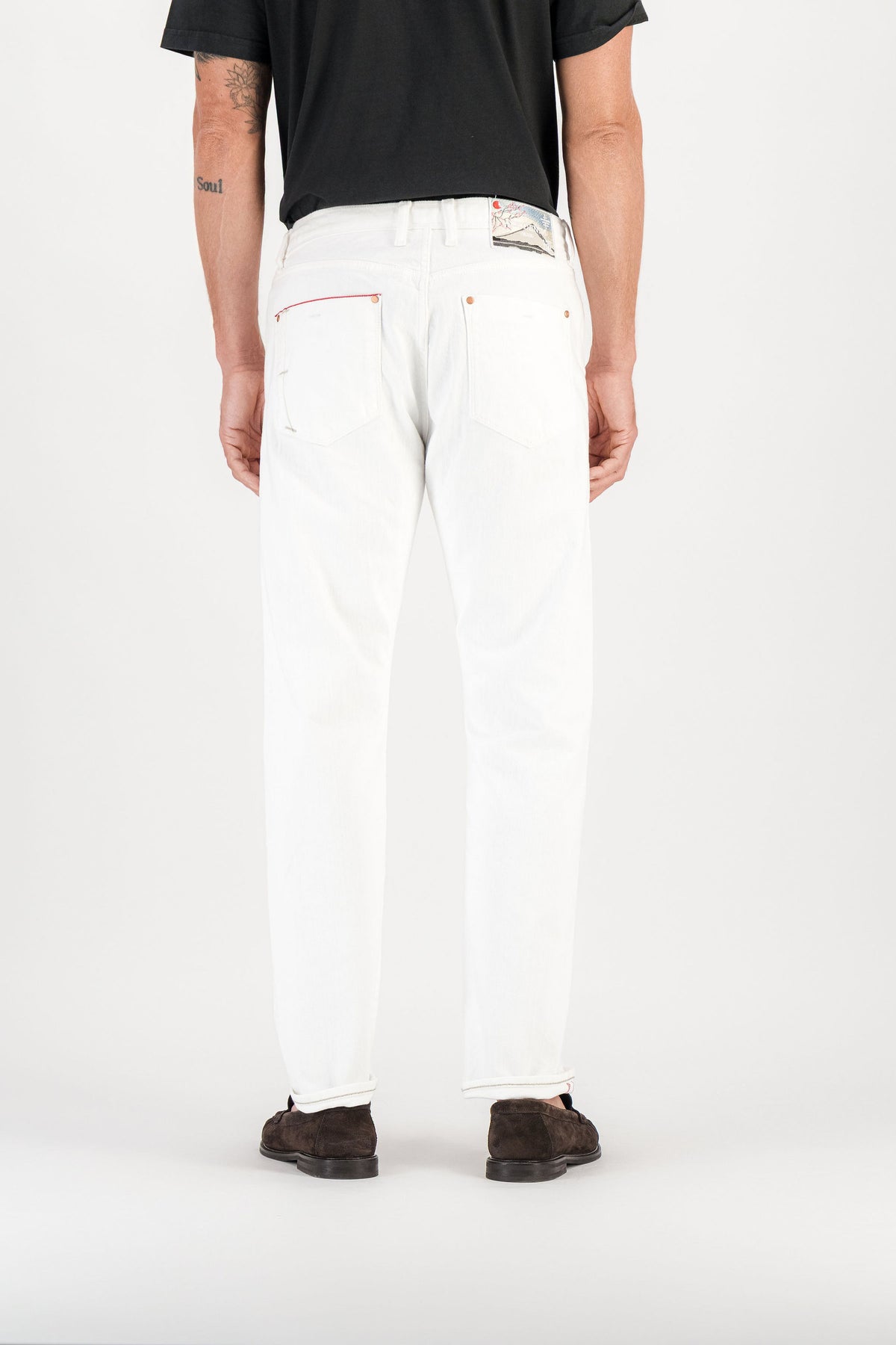 Back view white selvedge straight jeans worn, back pockets and Mont Fuji embroidered patch — AD 53 Selvedge Ace Denim Paris
