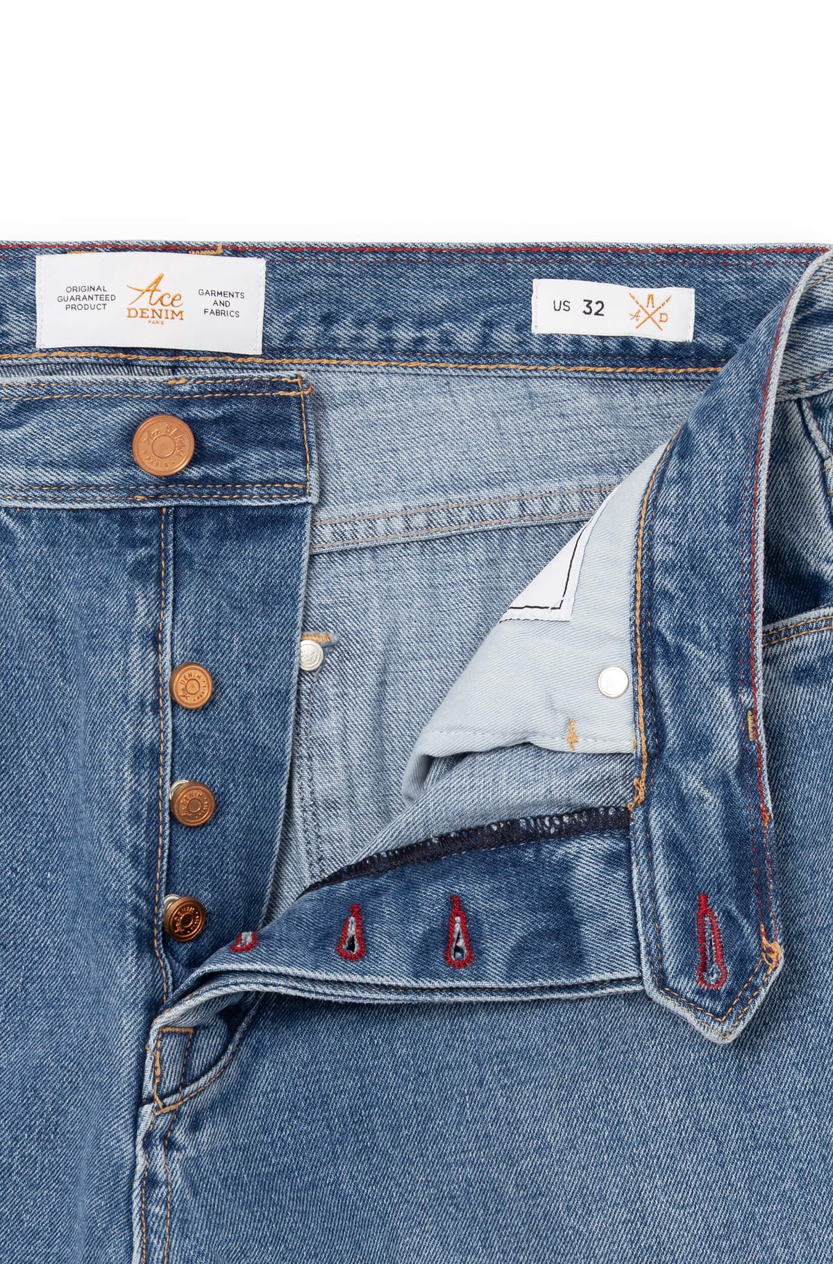 Détail braguette boutons cuivrés gravés et broderies intérieures signature — AD 53 Selvedge Ace Denim Paris