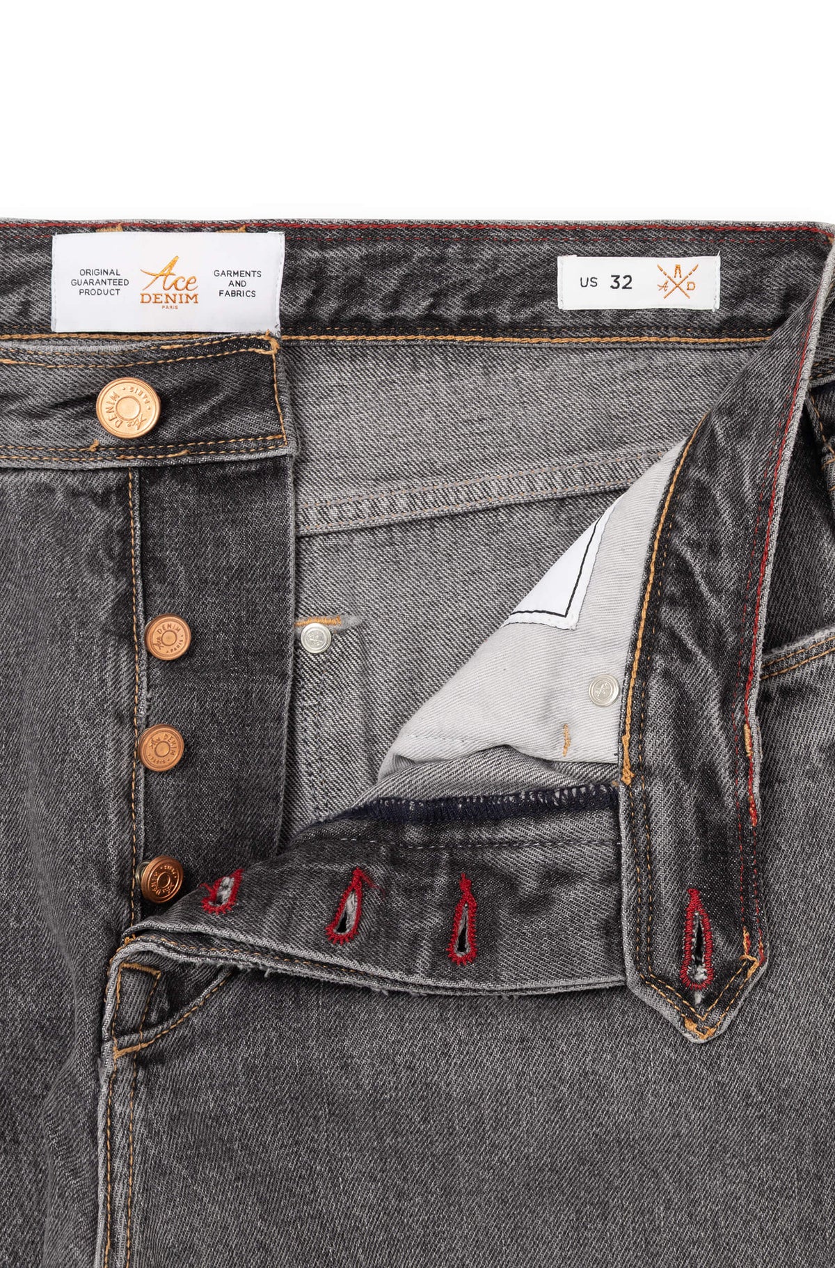 Détail braguette boutons cuivrés gravés et broderies intérieures signature — AD 53 Selvedge Ace Denim Paris