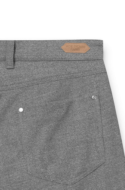 brown patch on the back of the gray trousers