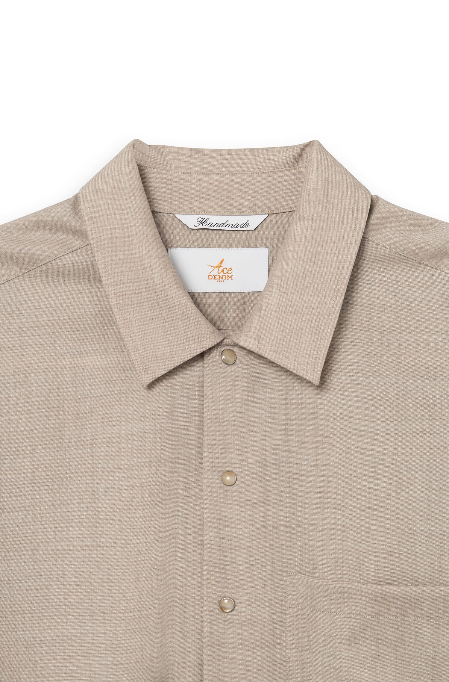 Detail of the classic shirt collar and signature snap buttons — AD 82 Ace Denim Paris