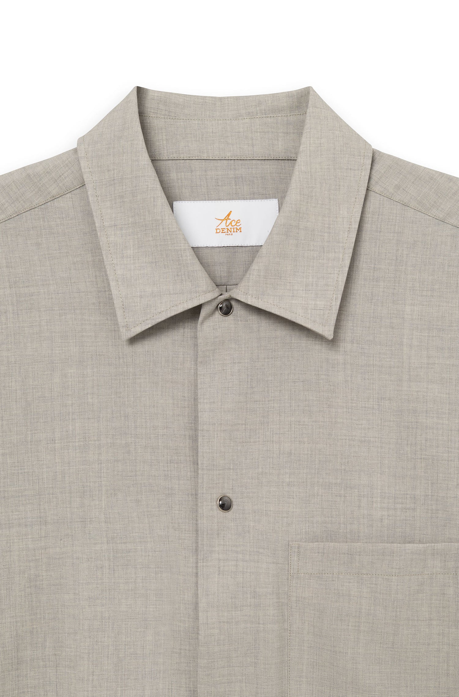 Detail of the classic shirt collar and signature snap buttons — AD 82 Ace Denim Paris
