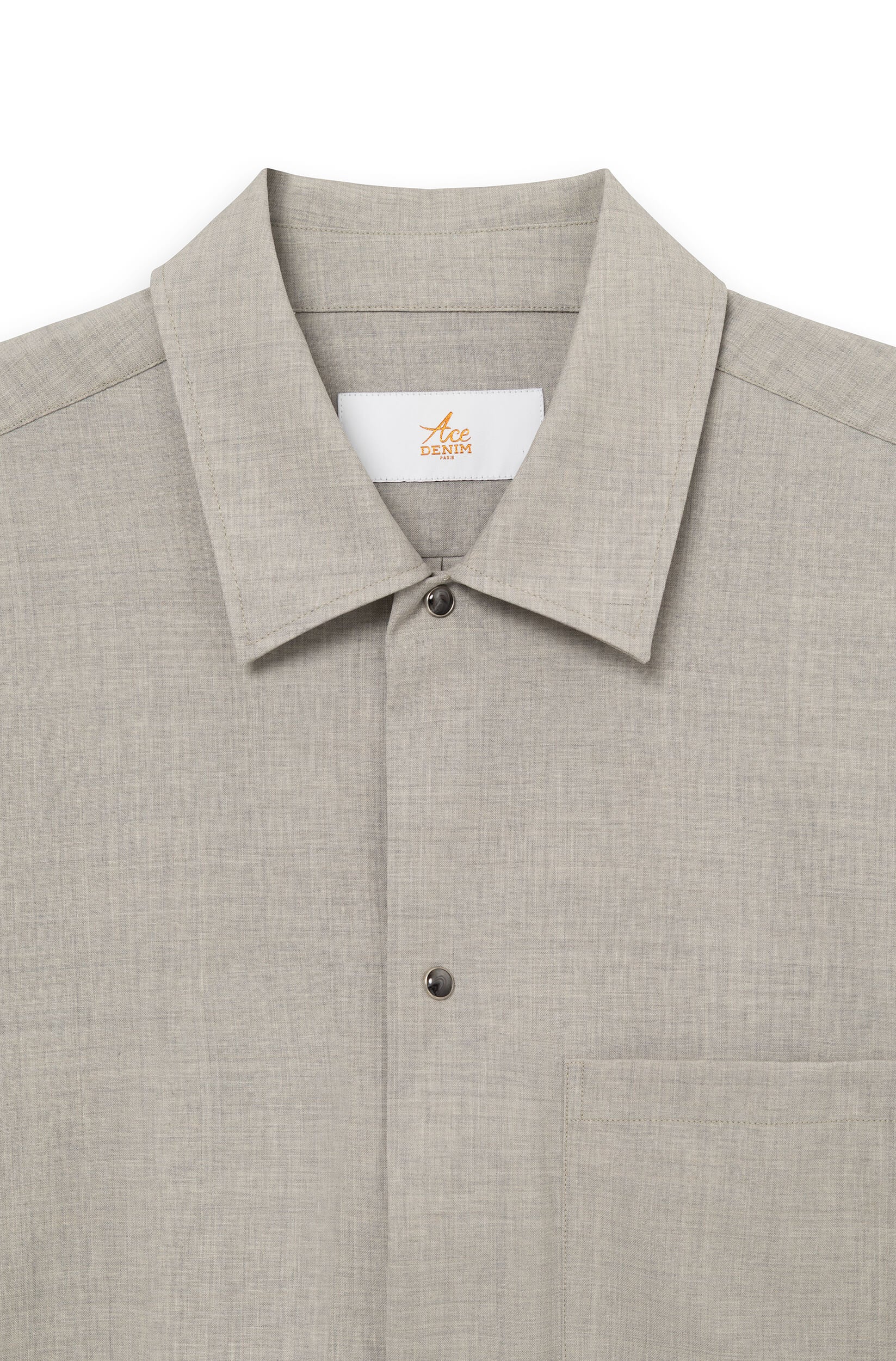 Detail of the classic shirt collar and signature snap buttons — AD 82 Ace Denim Paris
